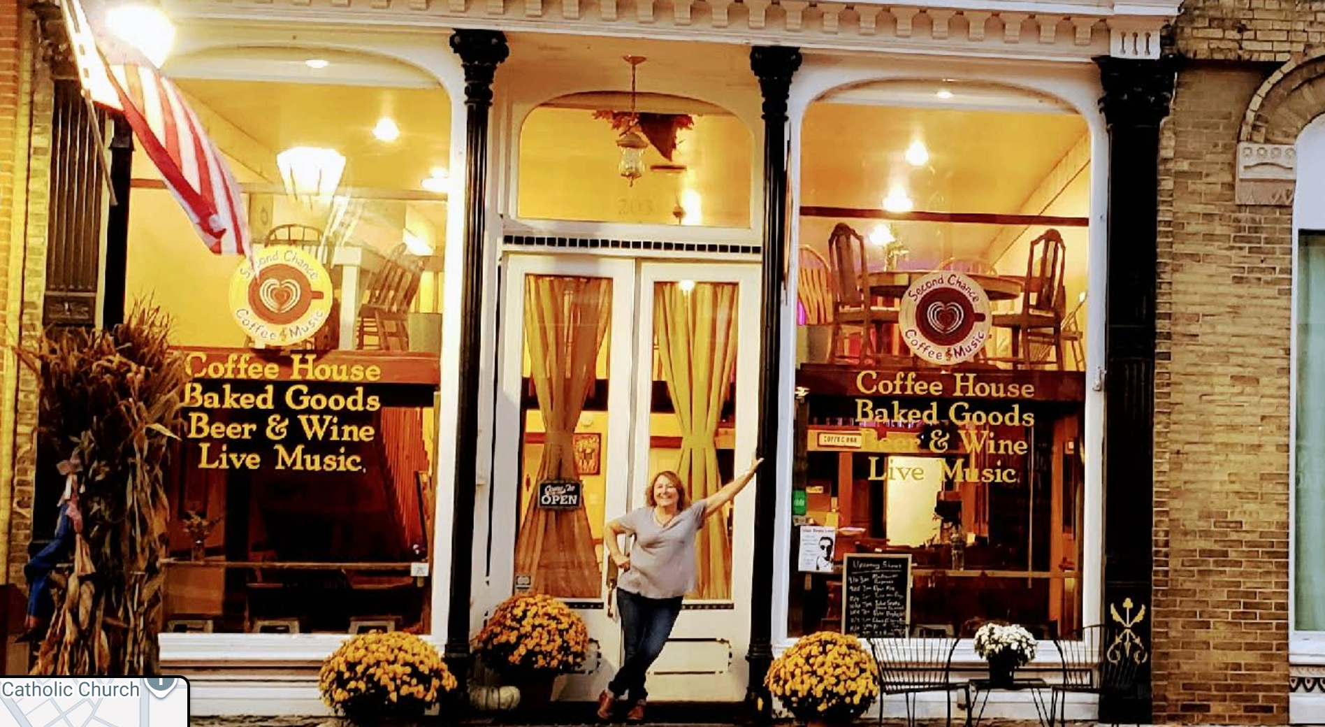 Owner welcoming guests at the Second Chance Coffee Shop storefront in Shullsburg